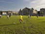 Soccer on Museumplein with Concertgebouw in background.