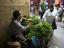 Man selling mint among narrow allies of Medina.