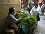 Man selling mint among narrow allies of Medina.
