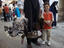 Boy with his father and his turkeys.
