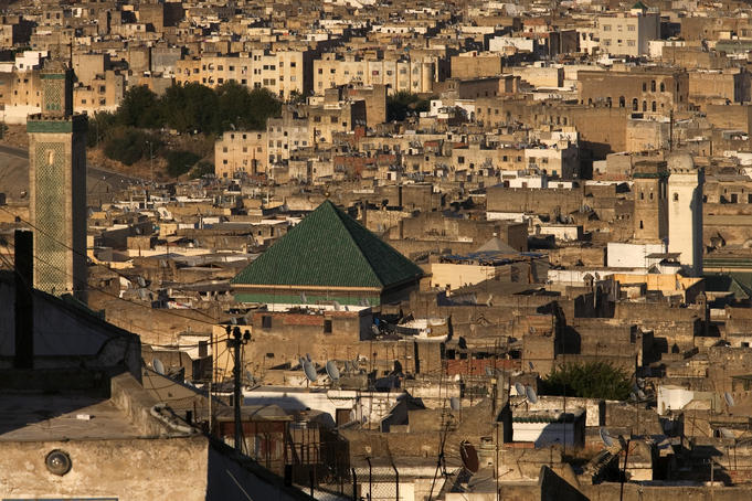 Overhead of Karouine Mosque surrounded by houses and buildings of Medina, Fès