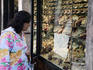 Women browses the jewellery shop, Rue Semmarine, Fez el-Jdid.