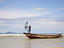 Man in fishing boat at River No 2, Tokey, Freetown Pennisula.