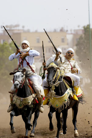 Berber horsemen compete in the 'Razzia'.