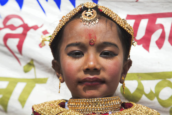 Child in traditional costume, Kumari (Living Goddess) Festival, Durbar Square.