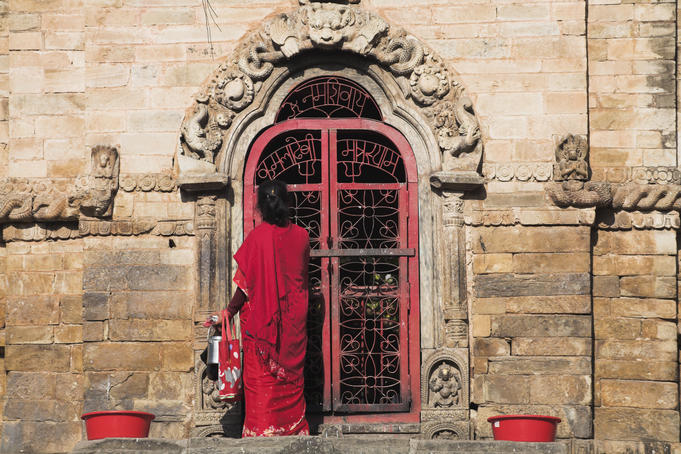Woman praying at temple, Hanuman-Dhoka Durbar Square.