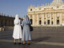 Nuns with St Peter's in background.