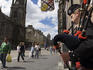 Busker playing bagpipes on Royal Mile.