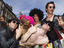Street performers on Royal Mile during Edinburgh Fringe festival.