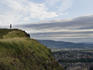 Walker on top of Salisbury Crags, Holyrood Park.