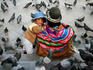 Indian parent and child on Plaza Pedro de Murillo.