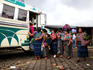 Group of Indian women waiting in throng for the bus