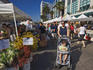 Shoppers and market stalls at Farmers Market on Arizona Avenue.