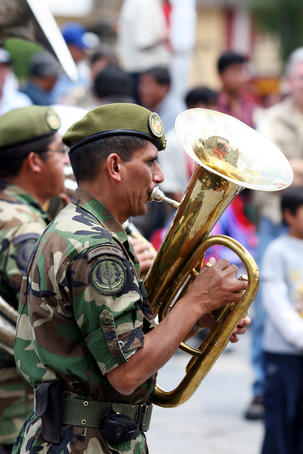 Military tuba player in the Plaza de Armas, Cajamarca