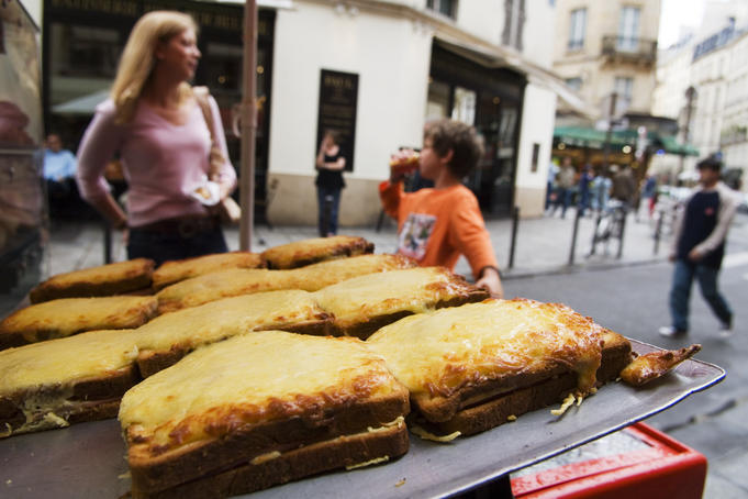 Croques (toasted cheese sandwiches) for sale on street in Place St-Germain des Bres area.