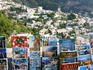 Postcards and souvenirs for sale, overlooking town on Amalfi Coast.