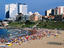 Swimmers and sunbathers at Playa Varese.