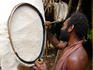 Baining tribesman preparing firedance mask, North Baining Mountains region, Gazelle Peninsula.