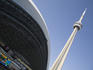 CN Tower rising beside the SkyDome/Rogers Centre stadium.