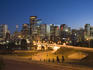 Skyline of Downtown Calgary, with Lions Bridge, at night.