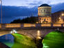 Illuminated Four Courts building and bridge over the River Liffey.