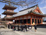Group of school children walking through Kiyomizu-dera temple grounds.