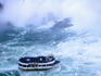 'Maid of the Mist' taking tourists for a wet ride in the spray of Horseshoe Falls, largest of the Niagara Falls.