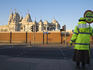 Lollipop lady in front of Shri Swaminarayan Mandiir Hindu Temple, Neasdon.