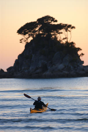Kayaking at sunrise, Torrent Bay.