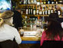 Couple of ladies drinking at The Loft bar, Okemo Valley.