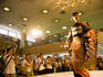 Model and photographers at fashion parade, Nishiji Textiles.