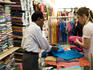Traveller shopping for salwar kameeze in Bangalore shop.