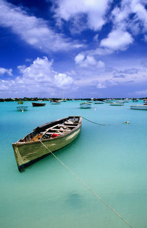 Fishing boats anchored in lagoon.