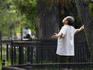Man exercising in Ritan Park.