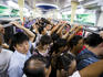 Train commuters packed on train during afternoon rush hour on a Chaoyang line train.