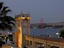 Palace Gate of the Ciragan Palace, with the Bosphorus Bridge spanning the Bosphorus Strait.