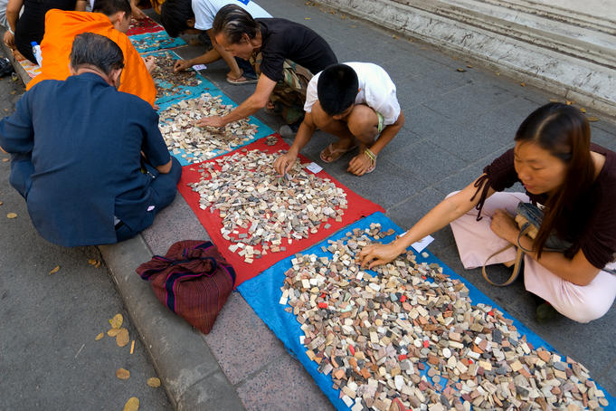 People and vendors at the Amulet Market.