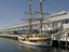 Somerset on the Pier apartments, with restored square-rigger Lady Nelson moored at Elizabeth Pier.