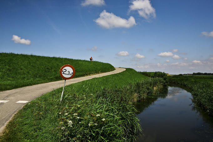 Narrow road by canal.