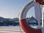 Frozen river and lifesaver ring, winter.