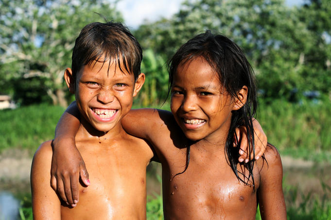 Portrait of happy children at Isla de la Fantasia.
