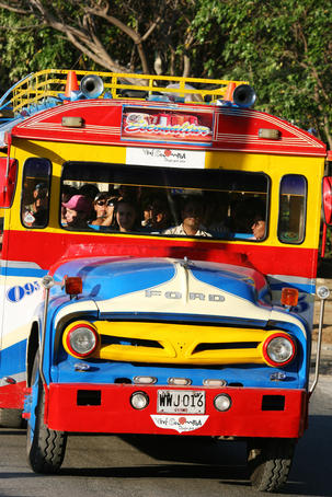 Colourful bus taking people back to Santa Marta.