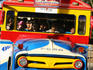 Colourful bus taking people back to Santa Marta.