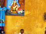 Vendor sitting at his shop inside the walled city.
