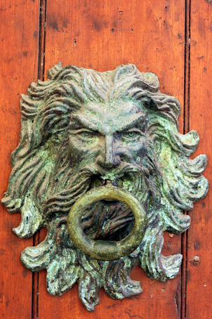 Large door knocker in the walled city.