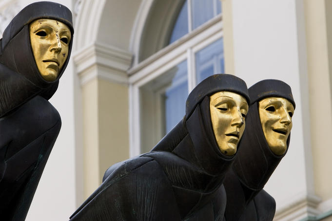 Statue of three muses created by sculptor S. Kuzma standing outside the National Drama Theatre on Gedimino prospektas, old town Vilnius.