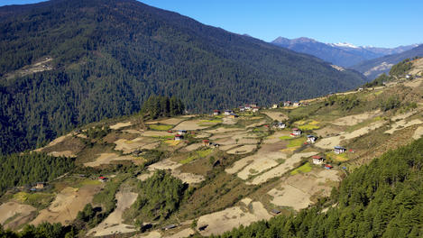 Overlooking houses and fields in the mountains of Western Bhutan.