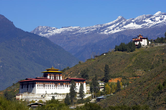 Monastery situated in Paro Valley, with mountains in the background.