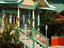 Entrance to colourful wooden house.