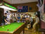 Enjoying a game of pool in bar of Hampshire Hotel.